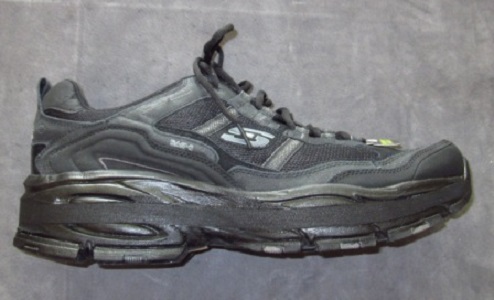 Custom shoe lift blended into sole for natural appearance
