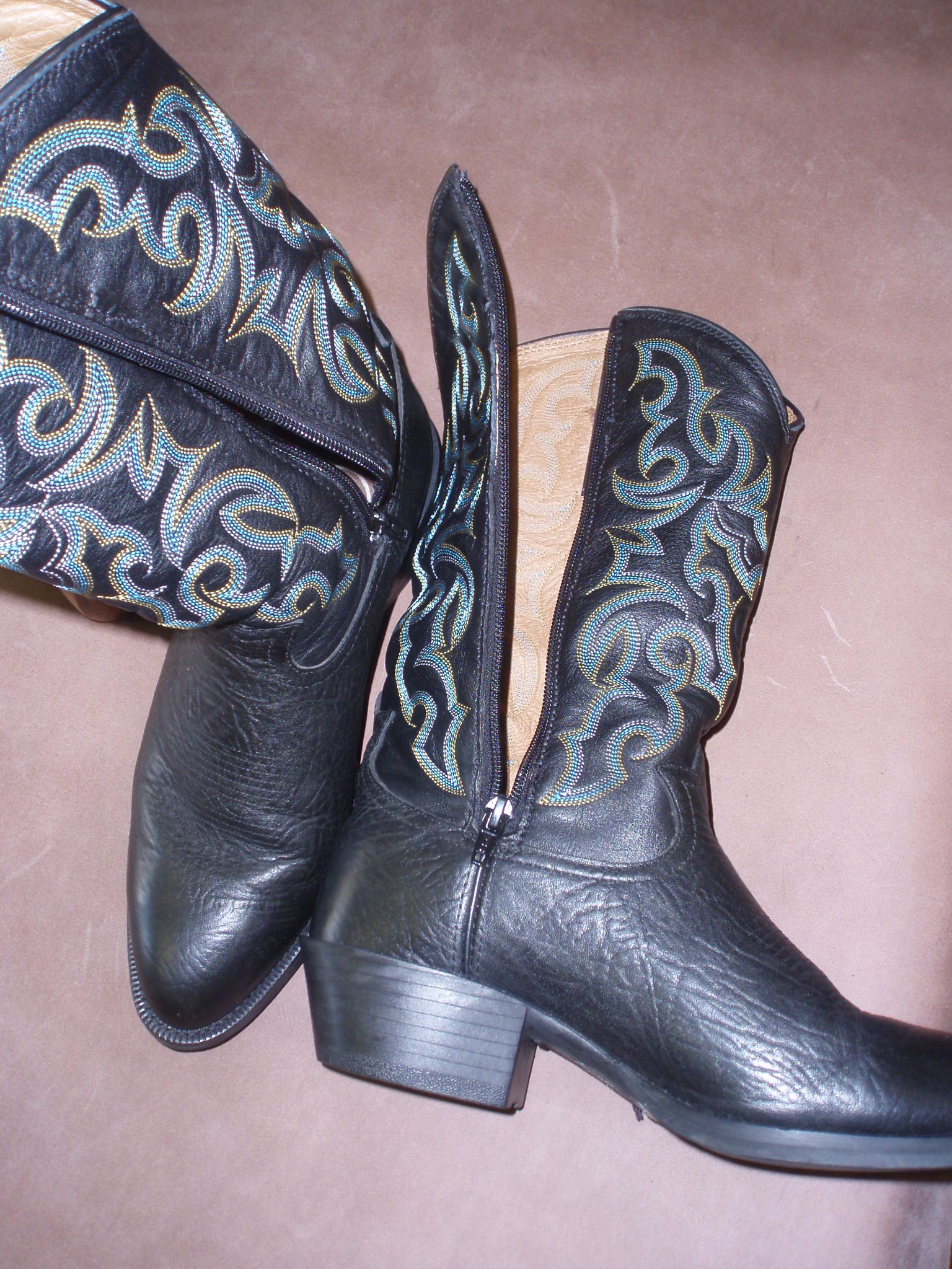 Cowboy boots with zippers we installed.