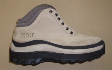 Three quarter inch orthopedic shoe lift added to leather walking boot