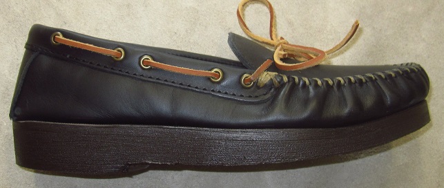 Height increase lift added to casual shoe for back pain relief