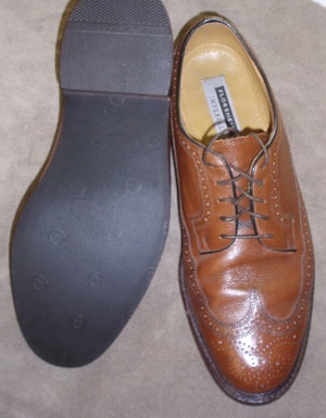 Topy rubber sole saver applied to men’s dress shoes