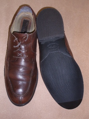 Finished Dockers shoe repair showing new outsoles